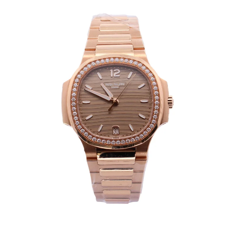 Patek Philippe Ladies Nautilus Rose Gold 32mm Champagne Stick Dial Watch Ref# 7010R/1R-013